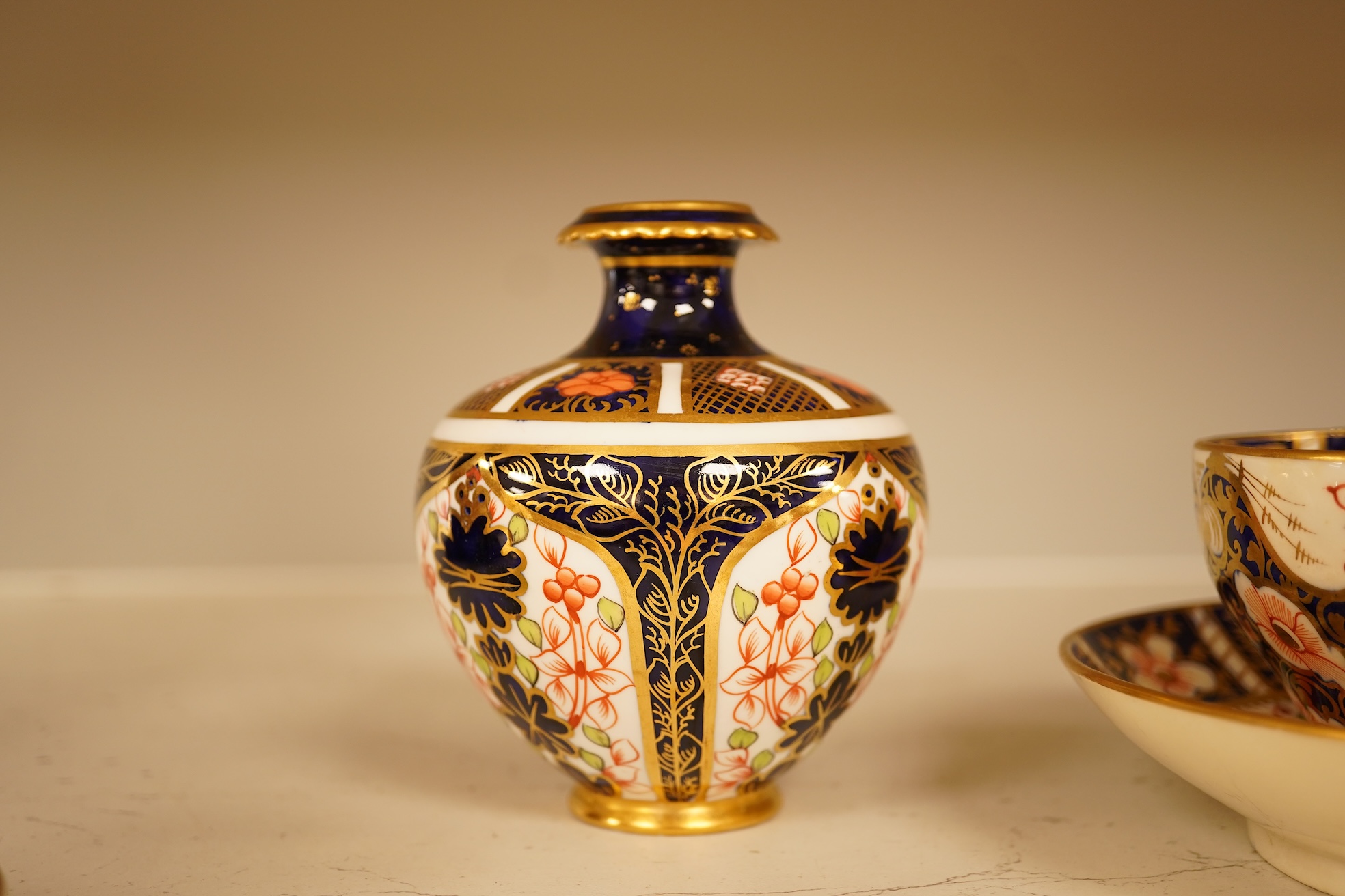 Twelve items of various patterns of Royal Crown Derby, largest item 27cm diameter